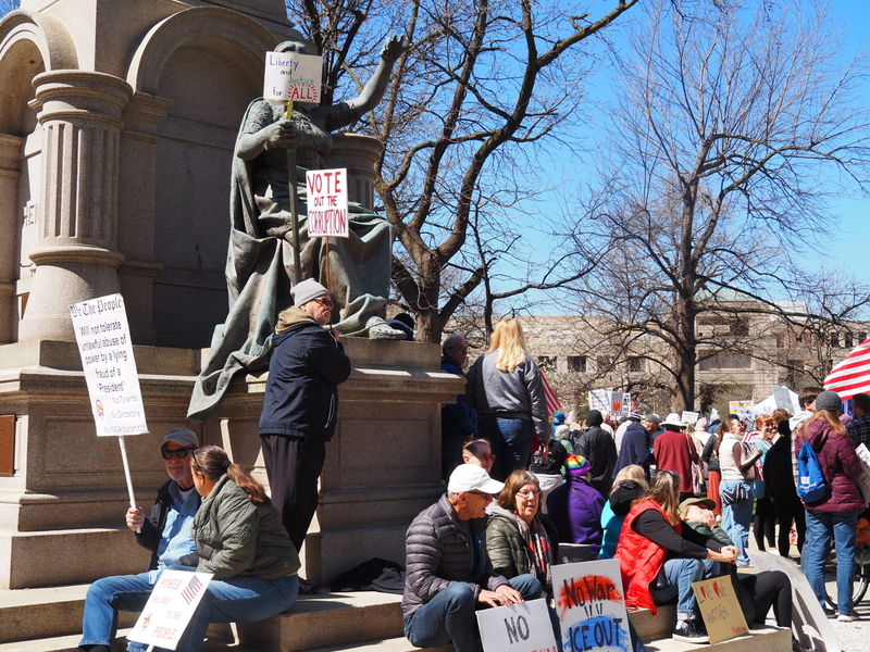 Sunny day greets thousands of anti-Trump protesters in Indianapolis