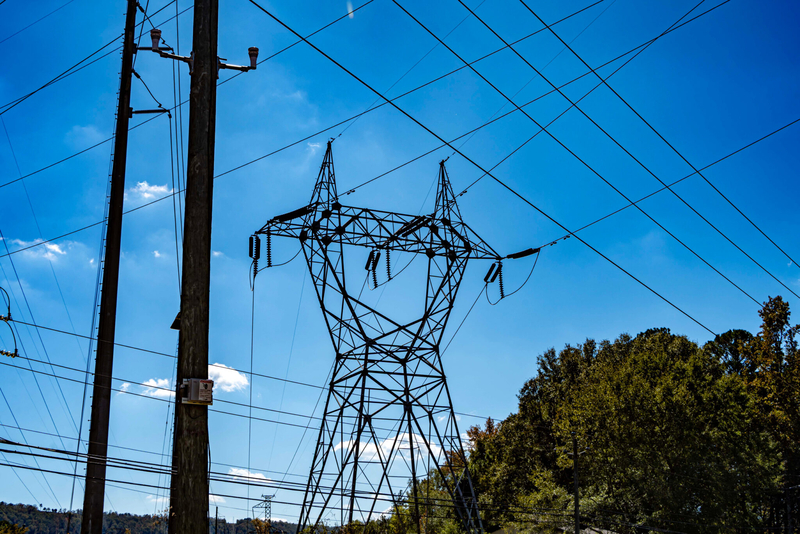 A large tower with power lines running off it