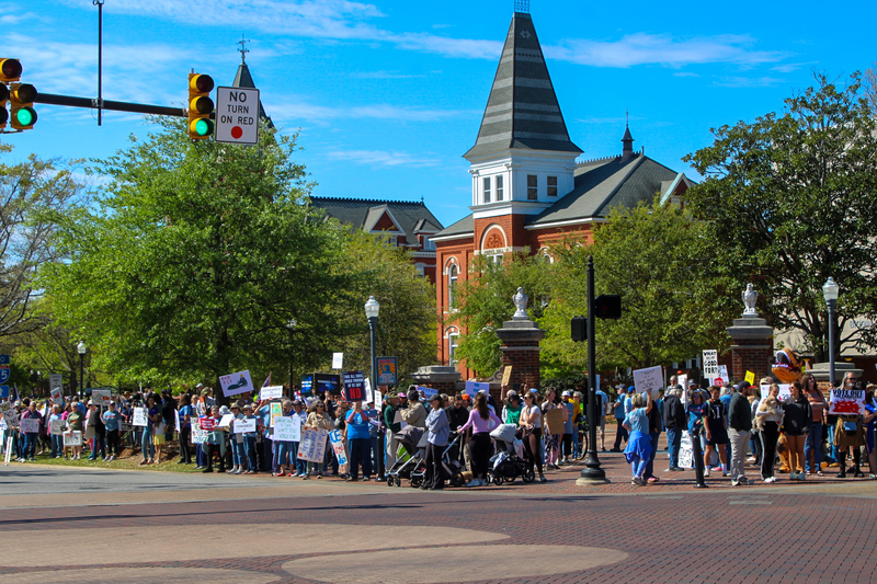 Protestors gathered on Toomer's Corner in Auburn, Alabama.
