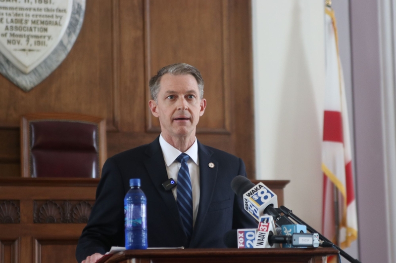 A man at a lectern