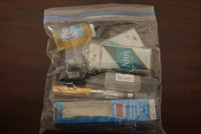 A collection of electronic cigarette products confiscated at various schools is seen on May 16, 2023, in the state capitol. The products were collected by Tim Lamkin, an aide to Senate President Gary Stevens, prime sponsor of three bills over aimed to reducing youth use of e-cigarette products, also known as vapes. (Photo by Yereth Rosen/Alaska Beacon)