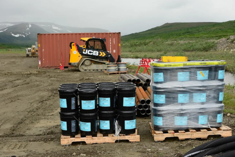 Some 30 miles outside Nome, supplies for Graphite One’s remote mining exploration camp wait at a staging area the company uses for its helicopters. (Photo by Berett Wilber for Northern Journal)