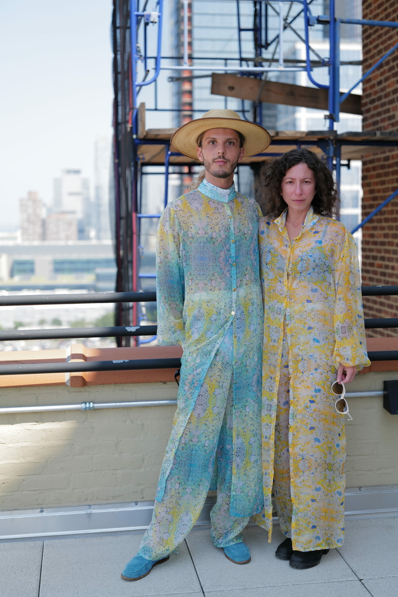 Garments from the Sea Ice Collection modeled in New York City by fashion designer Corentin Daudigny, at left, and filmmaker/artist Amy Lauren, at right. The designs were inspired by images collected by Marc Oggier, a scientist with the University of Alaska Fairbanks' International Arctic Research Center. (Photo by Umakant Jani/provided by University of Alaska Fairbanks)