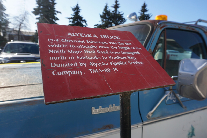 A sign describing the 1974 Chevrolet Suburban that was the first vehicle to drive the entire North Slope Haul Road is posted on April 29, 2024. (Photo by Yereth Rosen/Alaska Beacon)