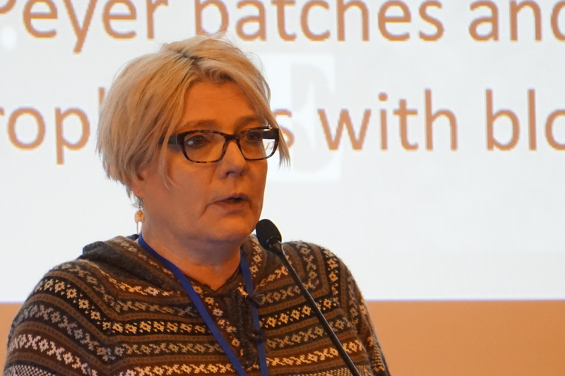 Lara Horstmann of the University of Alaska Fairbanks speaks on Jan. 30, 2025, at the Alaska Marine Science Symposium in Anchorage. Horstmann, a professor at UAF's College of Fisheries and Ocean Sciences, leads a group researching microplastic levels in Alaska marine mammals. (Photo by Yereth Rosen/Alaska Beacon)