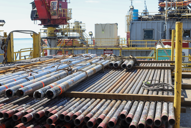 Pipe stacked for Furie's drilling effort this spring. If the company needs equipment that isn't onboard its offshore infrastructure, it sometimes has to get it from the North Slope, a 20-hour drive away. (Photo by Nathaniel Herz/Northern Journal)