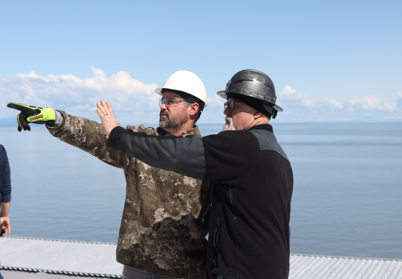 Furie Drilling Manager Michael Duncan, left, talks with Donnie Durham, the Spartan 151's rig manager. (Photo by Nathaniel Herz/Northern Journal)