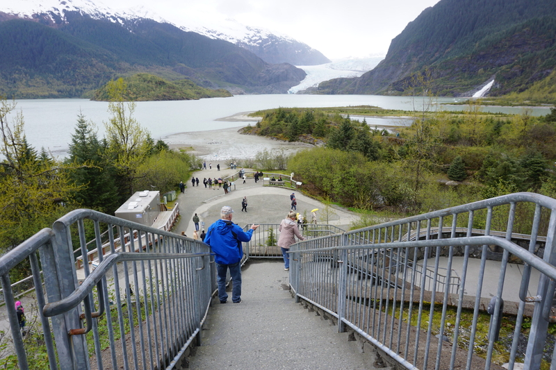Tourists view Mendenhall Glacier from the U.S. Forest Service visitor center on May 14, 2025. (Photo by Yereth Rosen/Alaska Beacon)