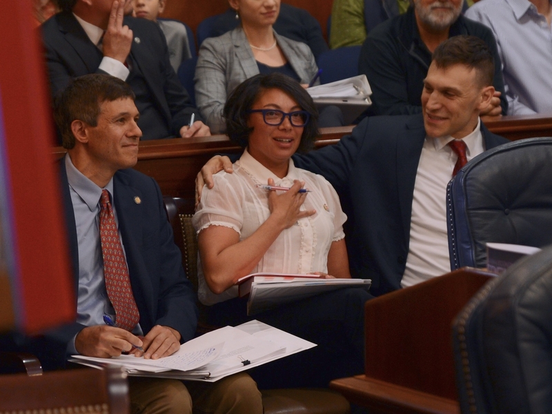 Sen. Loki Tobin, D-Anchorage, holds her hand to her chest on Saturday, Aug. 2, 2025, after the close vote on overriding Gov. Mike Dunleavy's veto of education funding. (James Brooks photo/Alaska Beacon)