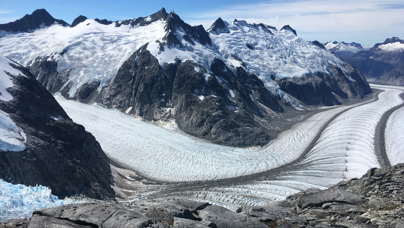 Ice, bedrock and surface debris at the Gilkey Glacier interact in 2017. The glacier is part of the Juneau Icefield. (Photo provided by the U.S. Geological Survey)