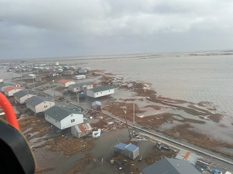 U.S. Coast Guard MH-60 Jayhawk helicopter aircrews conduct overflights of Kipnuk, Alaska, after coastal flooding impacted several western Alaska communities, Oct. 12, 2025. (U.S. Coast Guard photo courtesy of Air Station Kodiak)