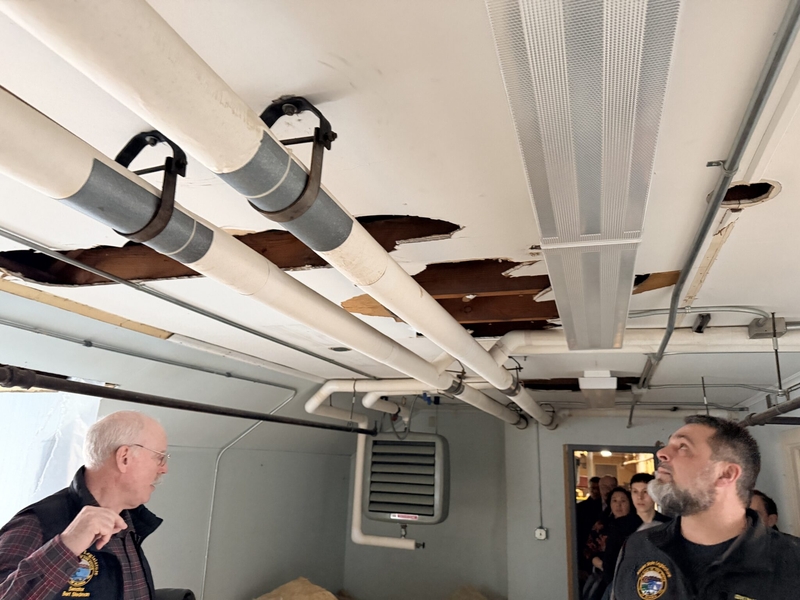 Alaska legislators inspect water damaged ceilings in the Mt. Edgecumbe girls dormitory on a visit on Feb. 6, 2026 (Photo courtesy of the Senate Finance Committee)