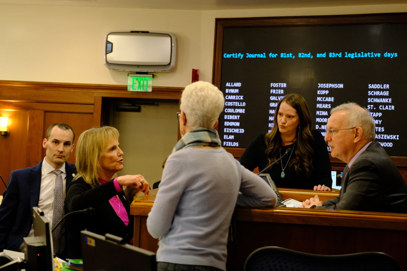House Minority Leader Rep. DeLena Johnson, R-Palmer discusses procedure with House Speaker Rep. Bryce Edgmon, I-Dillingham and House clerks during debate on the operating budget on Apr. 13, 2026. (Photo by Corinne Smith/Alaska Beacon)