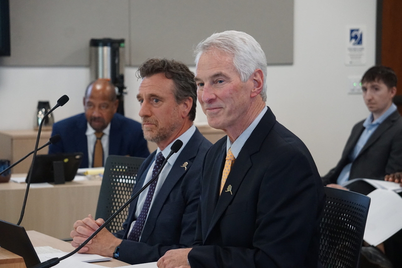 Matt Kissinger and Frank Richards of the Alaska Gasline Develoment Corp. prepare to testify to the House FInance Committee on May 27, 2026, in Anchorage.. Richards is AGDC's president and Kissinger is AGDC's venture develoment manager. The hearing was conducted as part of a special session called by Gov. Mike Dunleavy. Kissinger and Richards tesified in favor of property-tax concessions sought by Glenfarne, now the majority partner in the Alaska natural gas pipeline project. Dunleavy has argued that the tax