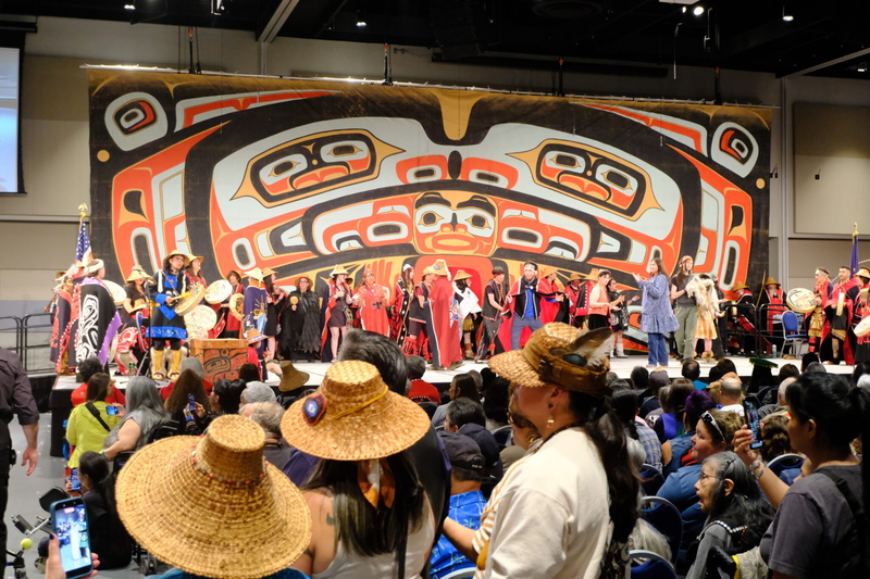 Dancers are seen parading across the main stage of Centennial Hall during the Grand Entrance of Celebration on June 3, 2026. (Photo by Corinne Smith/Alaska Beacon)