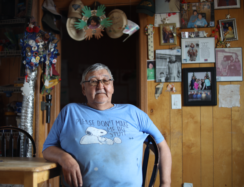 Harvey Joe sits in his home in Hooper Bay. (Nathaniel Herz/Northern Journal)