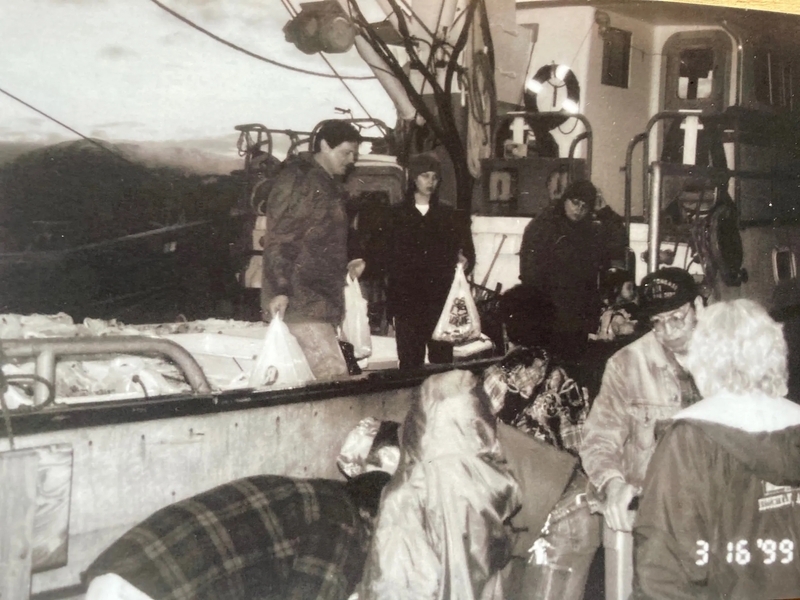 Louis Wagner Jr., rear left, delivers ooligan with his daughter Lee, center, and wife Cindy in this undated photo. (Photo courtesy of Cindy Wagner)