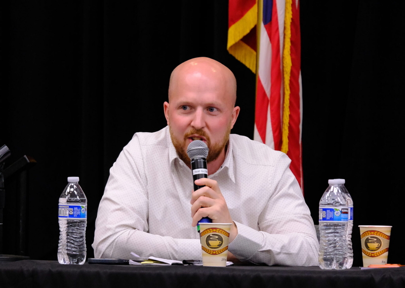 Jonathan Kreiss-Tomkins, a candidate for governor, speaks at a debate on education on July 30, 2026. (Photo by Corinne Smith/Alaska Beacon)