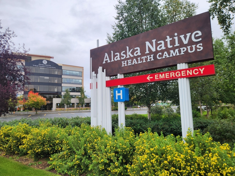 The Alaska Native Health Campus is seen on Sept. 6, 2026, with a sign pointing the direction to the Alaska Native Medical Center. (Photo by Yereth Rosen/Alaska Beacon)