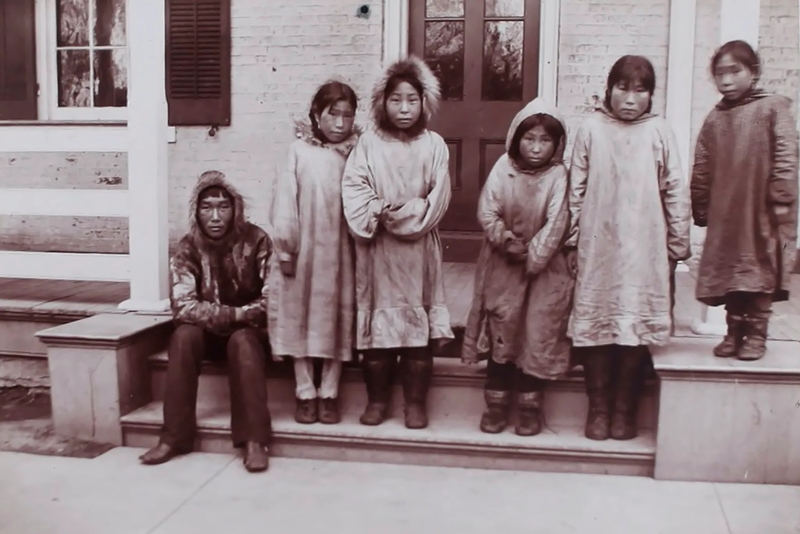 A group of Inupiat children from Alaska arrive at Carlisle Indian Industrial School on Nov. 18, 1897, in traditional clothing with fur-lined hoods. (Credit: Photo courtesy of the Presbyterian Historical Society.)