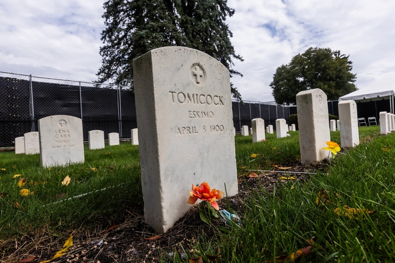 The grave of Tummassak (spelled Tomicock on the gravestone) is among more than a dozen Alaska Native students buried at the Carlisle Barracks Post Cemetery in Pennsylvania after dying while attending the school. Tummassak is set to be repatriated starting Sept. 25, 2026. (Credit: Photo by Charles Fox/Special to ICT)