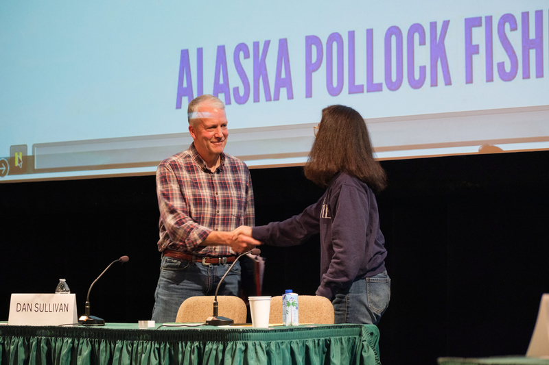 Sen. Dan Sullivan, R-Alaska, shakes hands with former Rep. Mary Peltola, D-Alaska, at the Sept. 12, 2026, fisheries debate held by the Kodiak Chamber of Commerce. (Photo by Brian Venua)