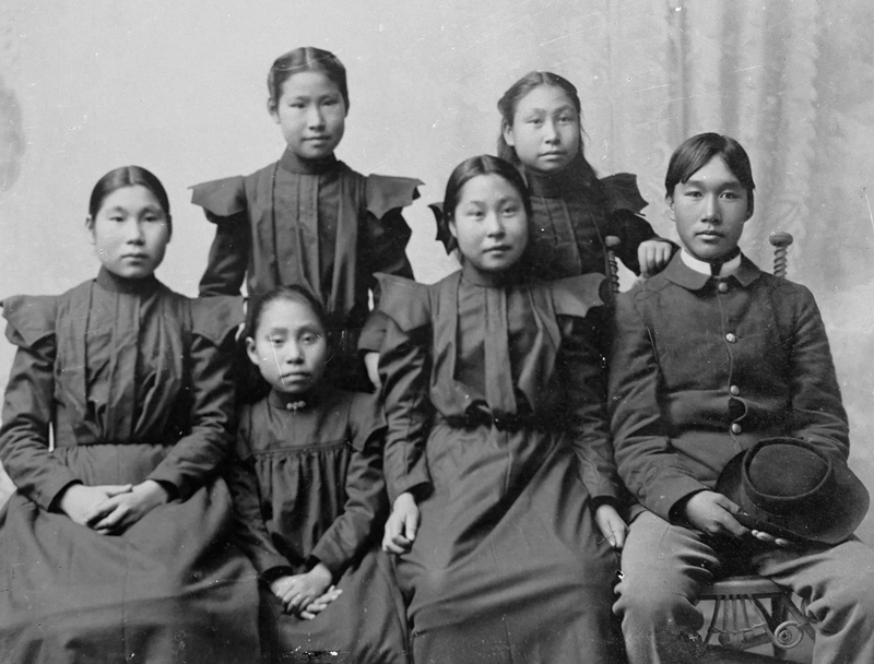 This photo shows a group of Alaska Native students after their arrival at Carlisle Indian Industrial School Nov. 18, 1897. At left is Tummassak, who died at the school and was buried in the cemetery there in Pennsylvania. (Photo by John N. Choate, courtesy of the National Anthropological Archives/Smithsonian Institution)