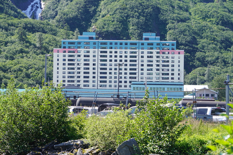 The 14-story Begich Towers building in Whittier is seen on July 17, 2025. The building is home to most of the town's residents. (Photo by Yereth Rosen/Alaska Beacon)