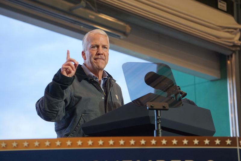 U.S. Sen. Dan Sullivan, R-Alaska, speaks at an Oct. 5, 2026, campaign rally in Fairbanks. THe headliner at the rallly was Vice President JD Vance, who traveled to Alaska with Sullivan on Air Force 2. (Photo by Yereth Rosen/Alaska Beacon)