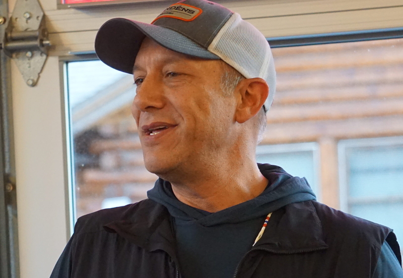Independent candidate Bill Hill, who is challenging U.S. Rep. Nick Begich III, speaks at a campaign event held Oct. 22, 2026, at Fire Island Bakery in downtown Anchorage, a few blocks from the Dena'ina Civic and Convention Center, site of the Alaska Federation of Natives annual convention. (Photo by Yereth Rosen/Alaska Beacon)