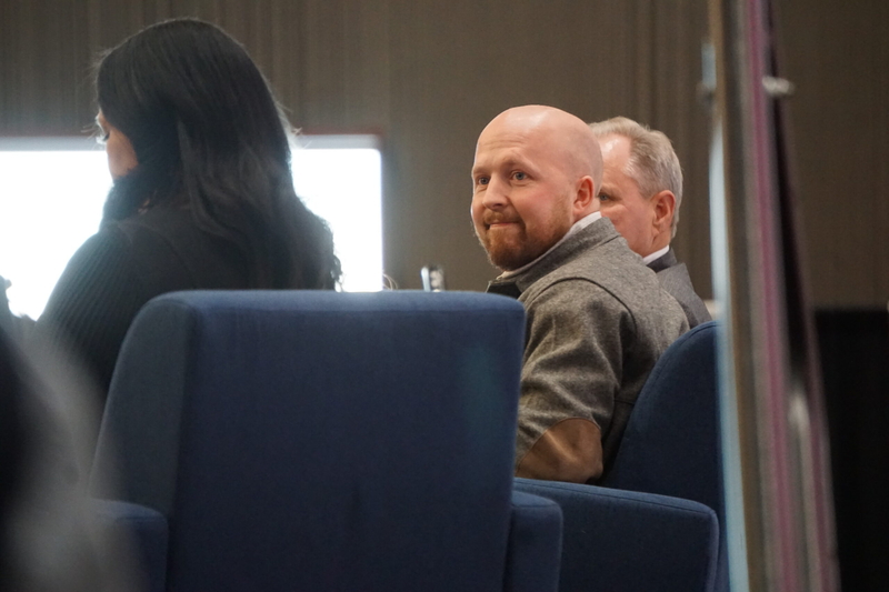 Kreiss-Tomkins and Republican Dave Bronson, both gubernatorial candidates, listen to a question posed by moderator Antonia Gonzalez, a journalist. (Photo by Yereth Rosen/Alaska Beacon)