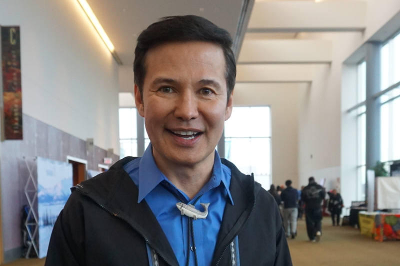 Rep. Neal Foster, D-Nome, stands a lobby of the Dena'ina Civic and Conventon Center in Anchorage on Oct. 23, 2026, during the Alaska Federation of Natives Convention. (Photo by Yereth Rosen/Alaska Beacon)