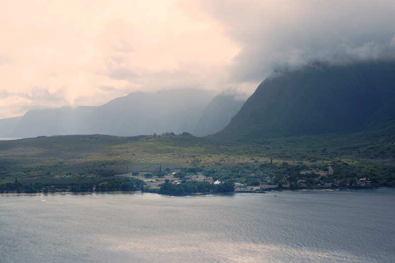 Kalaupapa is seen during the flight’s approach to the airport during the Kalaupapa Saints Tour Thursday, Sept. 18, 2025, in Kalaupapa. Covid closed Kalaupapa National Historical Park five years ago. Multiple state and federal agencies coordinated to allow a patient-owned tour company to bring visitors back. (Kevin Fujii/Civil Beat/2025)
