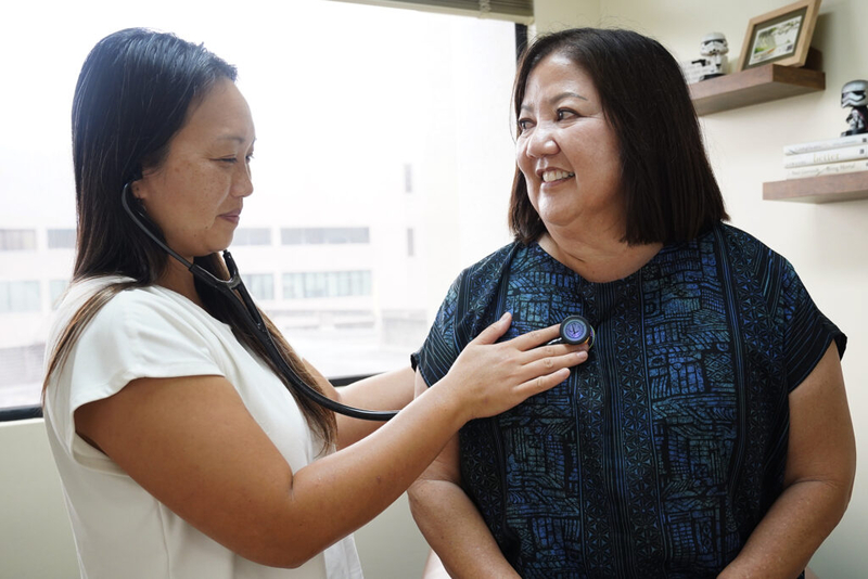 Dr. Donna Mayeda meets with patient Regina Yoshimori Monday, Feb. 2, 2026, in Honolulu.  (Kevin Fujii/Civil Beat/2026)