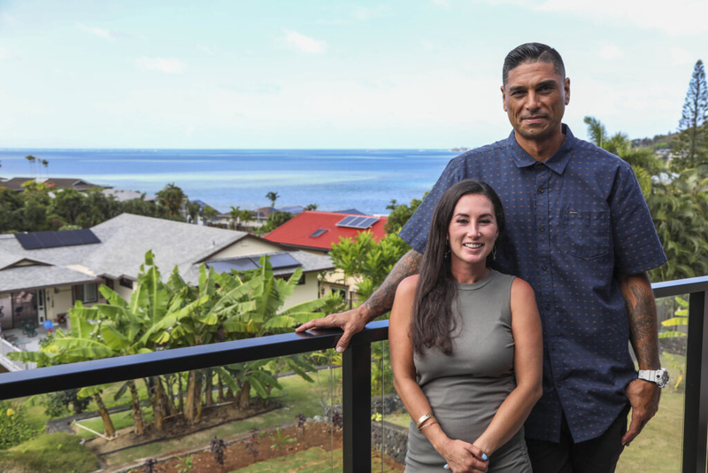 Tristyn (left) and Kamohai (right) on the new deck of the "Bee House," as seen on Renovation Aloha, Season 1.