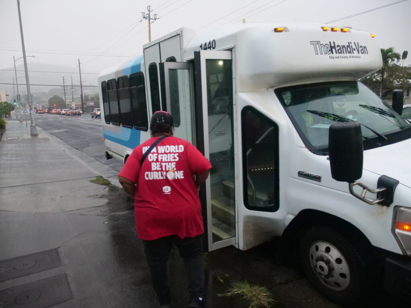 Andarina Petero boards a Handi-van, after work in Honolulu ,that will take back to the shelter in Waianae where she is staying until she can find more permanent housing for her and her daughter.. (Civil Beat photo Ronen Zilberman)