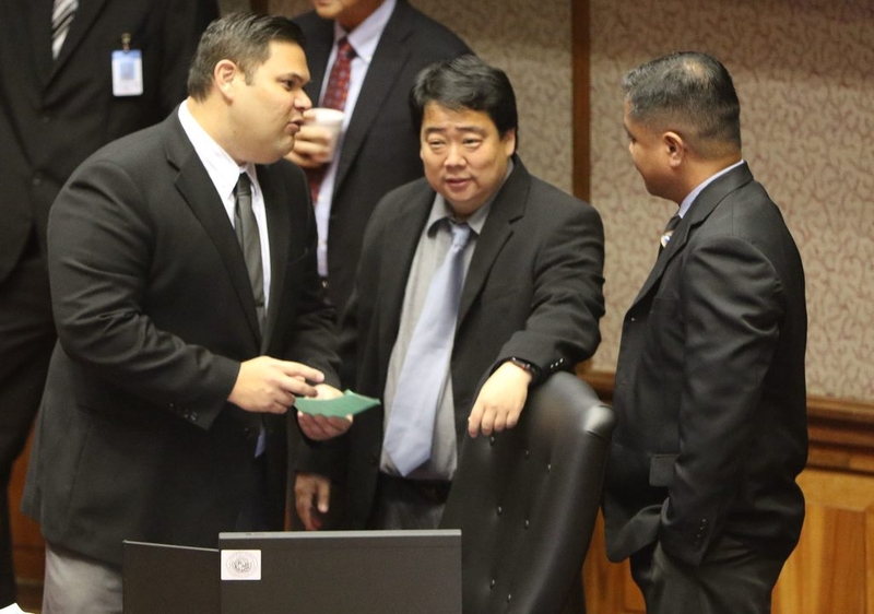 Center, Rep Ryan Yamane with left, Rep Ty Cullen right Rep Henry Aquino during recess at the Capitol. 6 march 2018