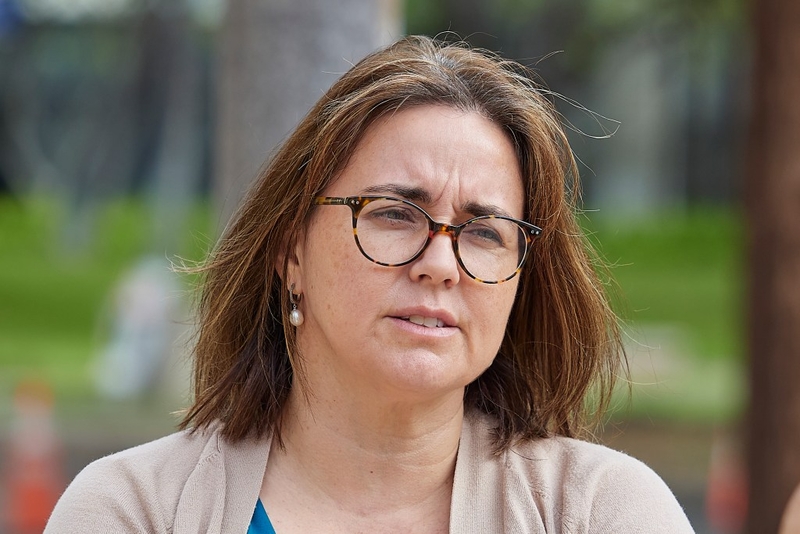 Minutes before the court opened Marti Townsend, the attorney for Earth Justice spoke to reporters about the Red Hill Fuel leak case against the US Navy, outside the Prince Jonah Kuhio Kalanianaole Federal building. (David Croxford/Civil Beat/2024