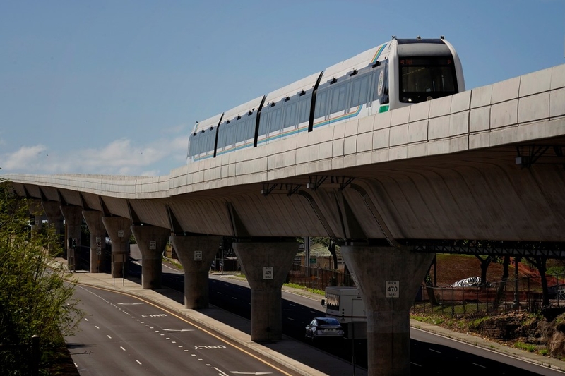 A Honolulu Authority for Rapid Transportation’s Skyline train  on the Section 2 route as seen from the Makalapa Pearl Harbor Naval Base station Thursday, Oct. 9, 2025, in Honolulu. (Kevin Fujii/Civil Beat/2025)