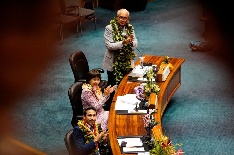 Sens. Mike Gabbard, from top, Donna Mercado Kim and Chris Lee applaud the Kapolei High School Hawaiʻian Immersion class in the gallery during the Hawaiʻi State Legislature opening Wednesday, Jan. 21, 2026, in Honolulu. (Kevin Fujii/Civil Beat/2026)