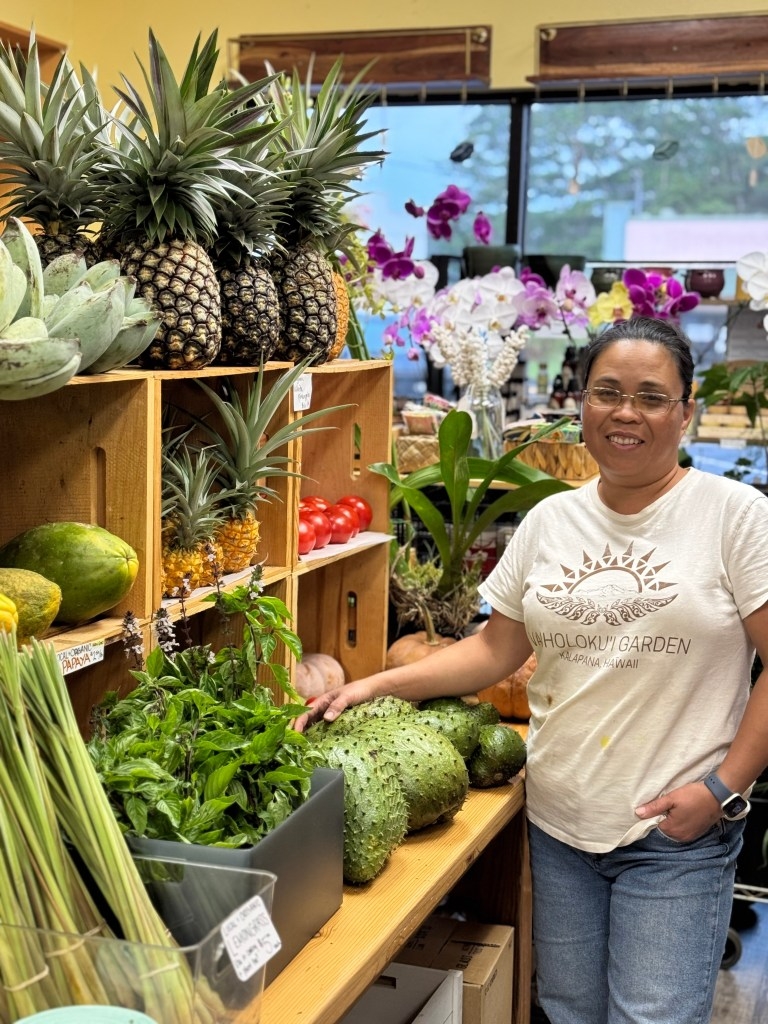 Elizabeth Ward, the owner of Waiholokui Garden, in her store.