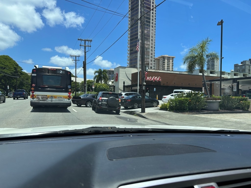 Vehicles lined up to order from the Chick-Fil-A on Sth. Beretania Street in Honolulu. The drivers blocked the designated bus lane, forcing the driver to stop and then move out of the lane to continue the route.
