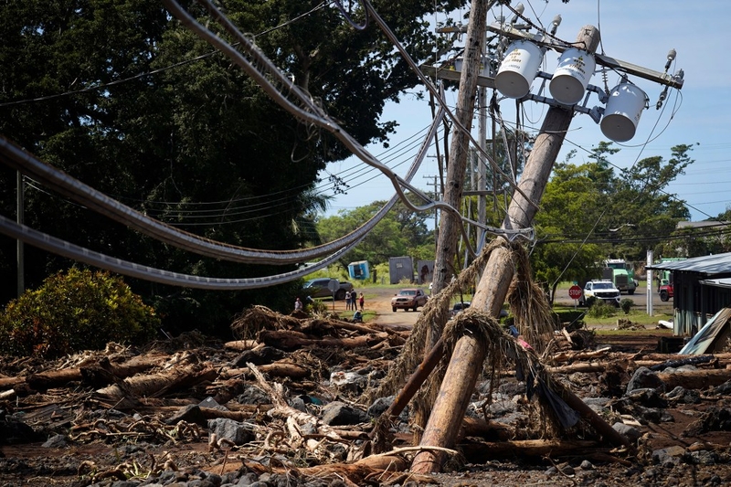 Kaʻalaiki Road from the Nāʻālehu Cemetery lies washed out and full of rubble Tuesday, Aug. 18, 2026, on Hawaiʻi Island. Hurricane Lala made a close pass to the South Point of the Big Island Saturday. (Kevin Fujii/Civil Beat/2026)