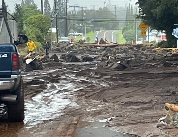 The main road through Nāʻālehu was litteered with debris and mud from inland, cutting the town off. (Courtesy: Sandy Sturbaum/2026)