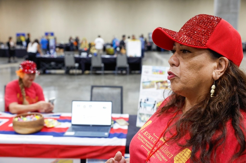 Iwalani Laybon-McBrayer, vice president of the Kaukea Homestead Association, explains the planned safety and security measures for neighborhoods within the association during the Dept. of Law Enforcement’s Public Safety Expo, Saturday, Sept. 26, 2026, at the Hawaiʻi Convention Center in Honolulu.  (Jamm Aquino/Civil Beat/2026)