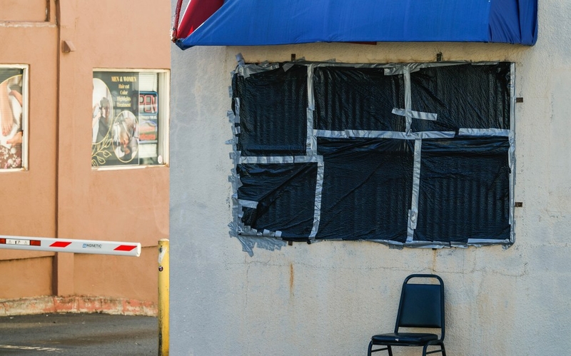 A back window is seen re-taped at Happy Days restaurant, Tuesday, Sept. 29, 2026, in Kaimukī. Cleanup efforts by the City and State have begun on the beleaguered restaurant, whose roof collapsed last month.  (Jamm Aquino/Civil Beat/2026)