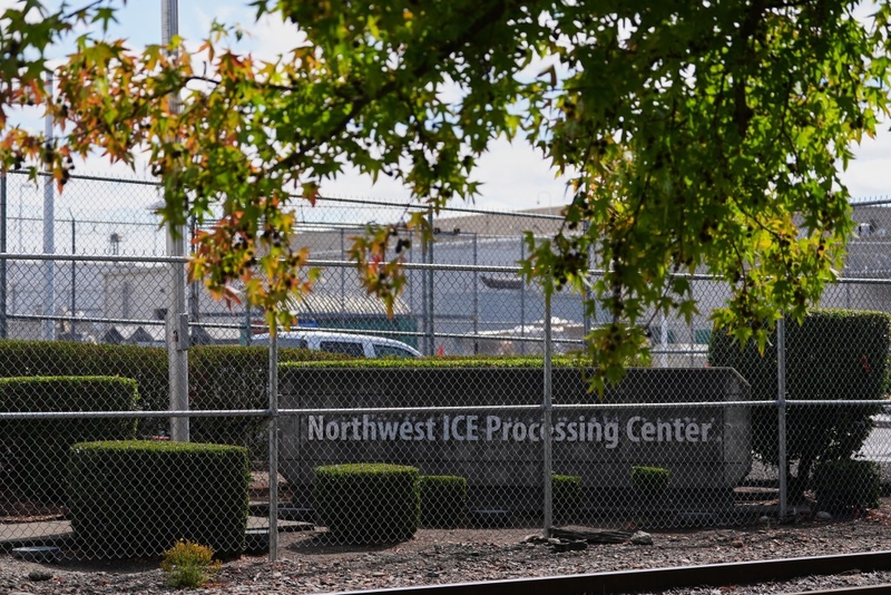 The entrance to the Northwest U.S. Immigration and Customs Enforcement Processing Center is seen, Aug. 13, 2025, in Tacoma, Wash. (AP Photo/Lindsey Wasson)