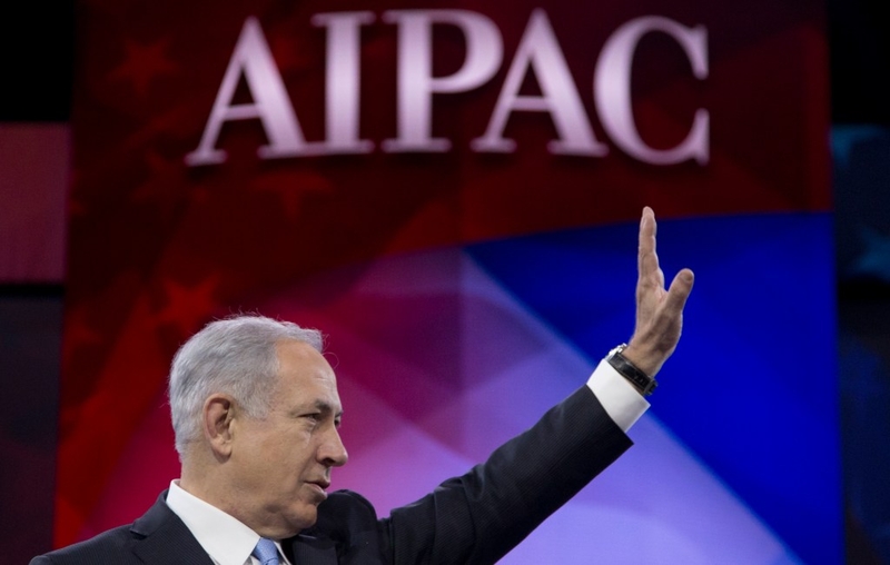 Israeli Prime Minister Benjamin Netanyahu waves to the cheering audience as he arrives to speak to the AIPAC meeting at the Washington Convention Center, Tuesday, March 4, 2014, in Washington.  (AP Photo/Carolyn Kaster)
