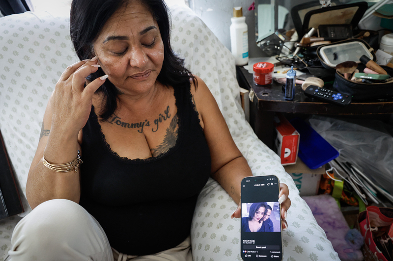 Kēhau Manijo shows a photo of herself and Tommy Manijo at her residence, Friday, Oct. 2, 2026, in Waiʻanae.  (Jamm Aquino/Civil Beat/2026)