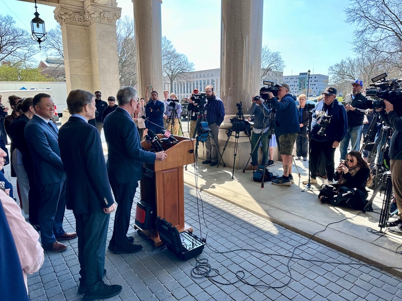 From the left, Josh Elliott pumps up his challenge to Ned Lamont